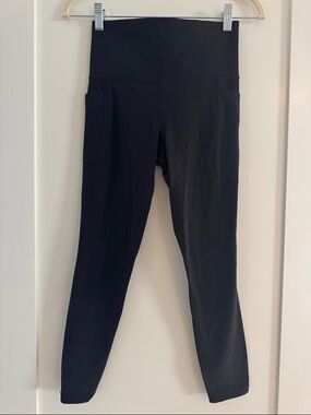 Athelta Salutation Stash 7/8 Tight Black size XS